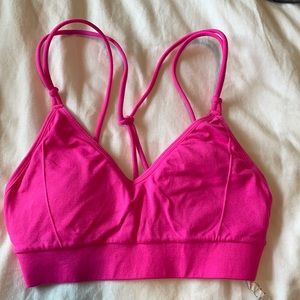 Fabletics hot pink cross cross back sports bra